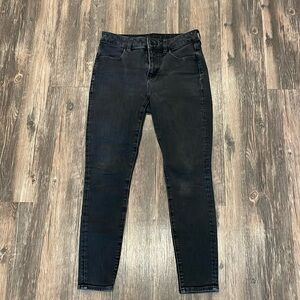 American Eagle Dream Stretch jeans.  Not distressed and is a lighter black wash.
